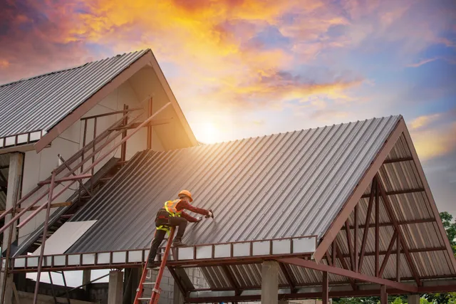 Roofing crew working on a premium roof installation